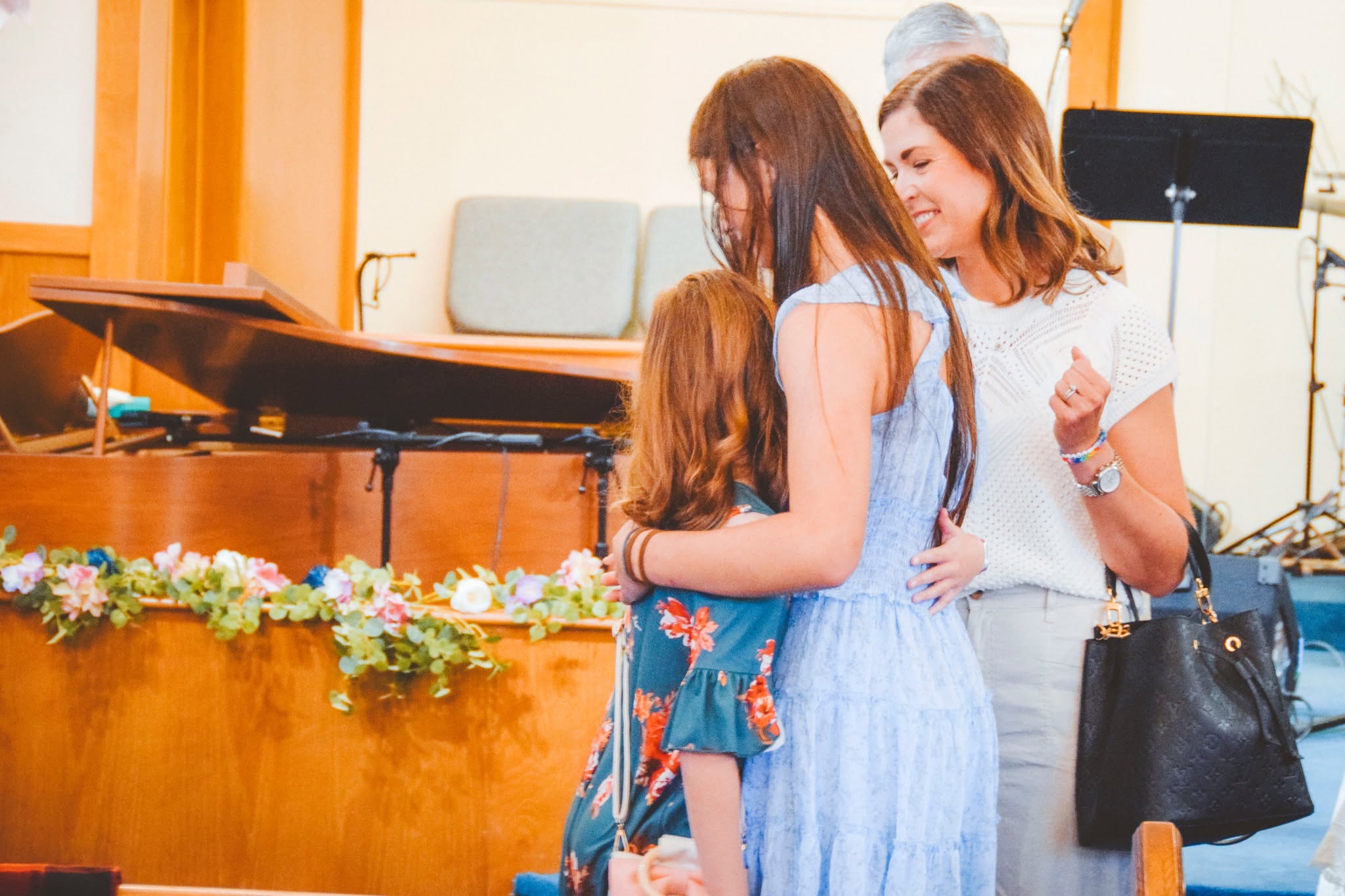 Women sharing encouragement after worship at FBC Gordon